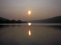 Early morning sun rise on the Ohio River in the western area of Cincinnati, Ohio, The Photograph